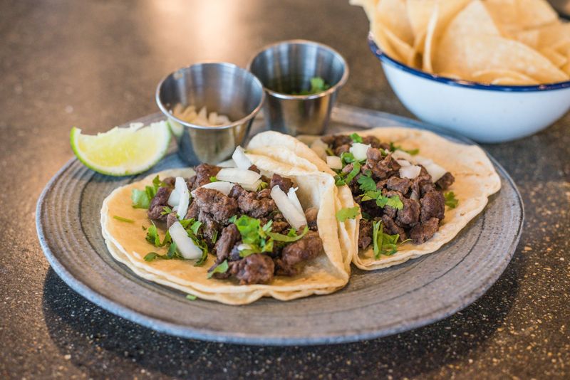 Fresh tacos with colourful toppings at GYG Sydney