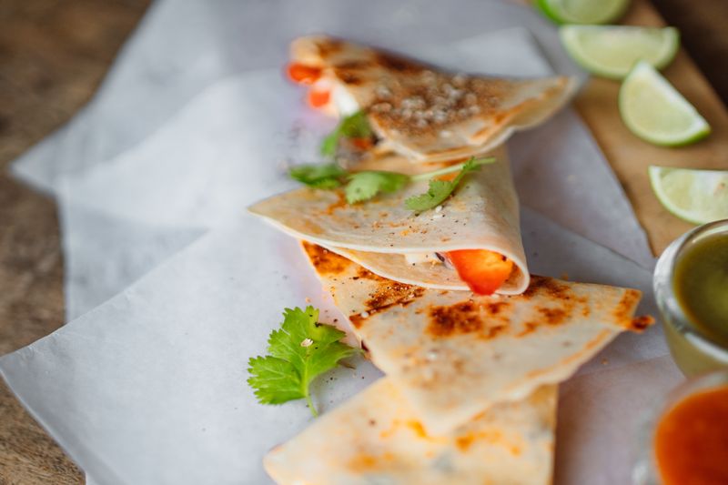 GYG kitchen team preparing fresh Mexican food